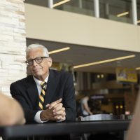 Dr. Bill Stackman, vice chancellor for Student Affairs, visits with students in the MU Student Center. Sam O'Keefe/University of Missouri