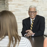 Dr. Bill Stackman chats with students