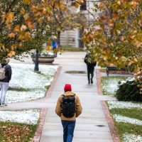 Students cross the snowy Mizzou campus