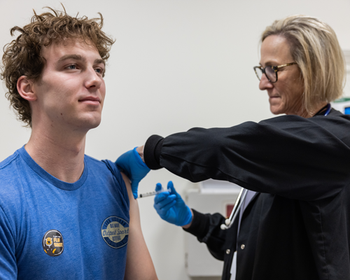 Student getting flu shot.