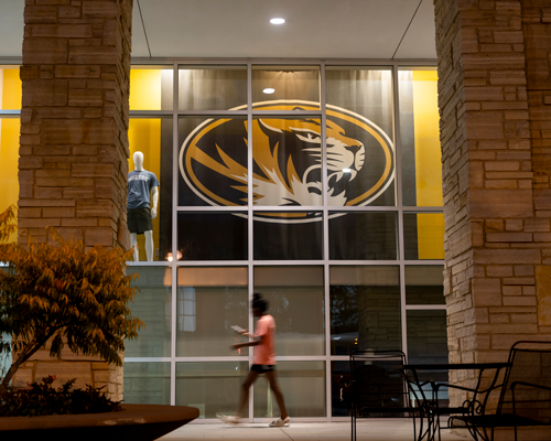Students walking in front of student center.